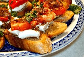 Heirloom Tomato Bruschetta with Bacon, Fresh Mozzarella and Basil is probably the best appetizer I've ever made.