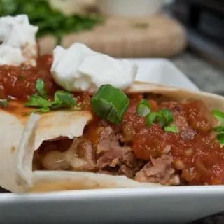 Cheap, easy and delicious, Lincoln Town Car Burritos are a frugal meal of beans, but the pickled onions take them over the top.