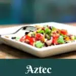 Aztec Salad is the perfect side dish for grilling out, or a light, tasty, healthy vegetarian lunch. A veggie salad with plenty of protein. #salad #healthy #easy #blackbeans #corn #tomatoes