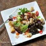 Salad with Navy Beans, Goat Cheese, Grape Tomatoes and Warm Bacon Vinaigrette is more of a meal than a salad. #summer #summerrecipe #goatcheese #summersaladrecipe