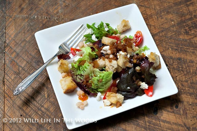 Salad with Navy Beans, Goat Cheese, Grape Tomatoes and Warm Bacon Vinaigrette is more of a meal than a salad. #summer #summerrecipe #goatcheese #summersaladrecipe