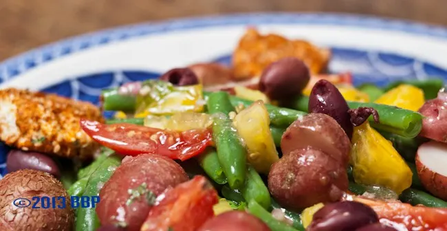 Farmer's Market Salad is a composed salad that can be varied to fit whatever shows up fresh in YOUR produce basket, but the spiced slices of goat cheese are not to be missed! Heavenly! #goatcheese #salad #composedsalad #summer #veggies #freshproduce