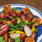 Permalink to: Farmers Market Salad with Spiced Goat Cheese Medallions Farmer's Market Salad with Spiced Goat Cheese Medallions is a composed salad recipe made with the fresh vegetables of summer.