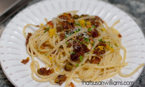 A vegetarian pasta with browned butter, dried fruits and nuts.