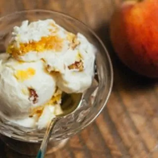 Homemade Bourbon Peach Ice Cream with Buttered Pecans: in honor of National Ice Cream Day. #nationalicecreamday