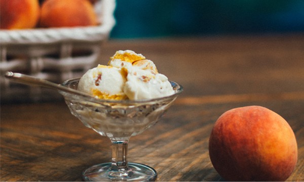 Homemade Bourbon Peach Ice Cream with Buttered Pecans