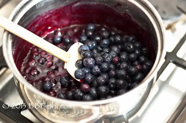 Adding the 2 cups of fresh, uncooked blueberries
