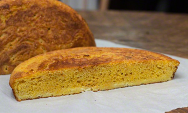 Best Buttermilk Cornbread, halved. My Best Buttermilk Cornbread recipe is made in a cast iron skillet #cornbread #freshgroundcornmeal #southerncooking #castiron