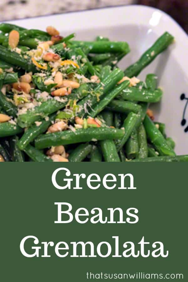 My favorite holiday side dish, whether for #Easter, #Thanksgiving or #Christmas, these green beans are cooked crisp-tender, and have a gremolata topping of #pinenuts, #lemonzest, and #garlic. #HolidaySideDish #GreenBeans