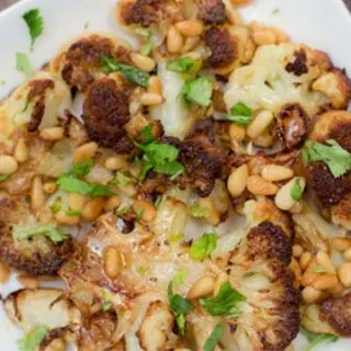 Cauliflower with Pine Nuts, Browned Butter, and Lime is the best roasted cauliflower recipe I have ever had.