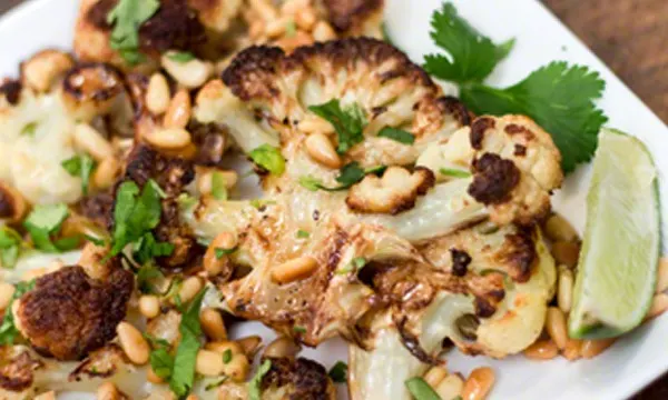 Cauliflower with Pine Nuts, Browned Butter, and Lime is the best roasted cauliflower recipe I have ever had.