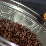 How To Roast Gourmet Coffee Beans at Home (and save money). Can you believe we do it in a WhirleyPop?#coffeebeans #roastcoffeebeans #greencoffeebeans #popcornpopper #DIY