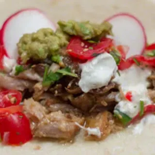 Mexican Carnitas Tacos Recipe with Fresh Tomato Salsa in a Lodge Enameled Cast Iron Dutch Oven