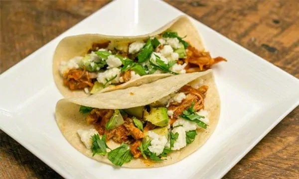 Tinga de Pollo: Shredded Chicken Tacos are easy to make and full of delicious smoky, tangy, fresh and creamy flavor! #tacos #weeknightmeal #chicken #avocados #tingadepollo