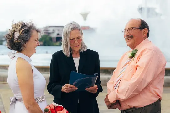 Saying wedding vows at the fountain at Point State Park.