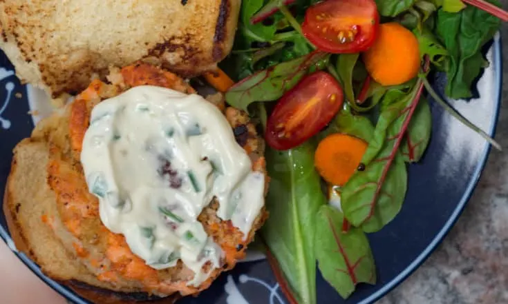 Wild Salmon Burger with Lemon, Capers and Toasted Sesame Mayonnaise: a more affordable way to enjoy salmon burgers.