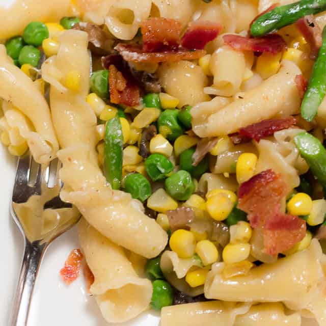 Sweet Corn and Spring Vegetable Pasta is a delicious, quick and easy recipe that is perfect for a weeknight meal. 