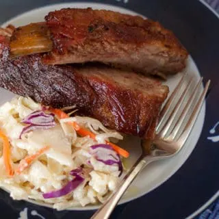 Slap yo' Mama Ribs, with delicious Slap yo' Mama Rib Rub, are started in the oven and finished on the grill, with a little smoke.