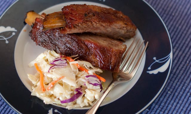 Slap yo' Mama Ribs, with delicious Slap yo' Mama Rib Rub, are started in the oven and finished on the grill, with a little smoke.