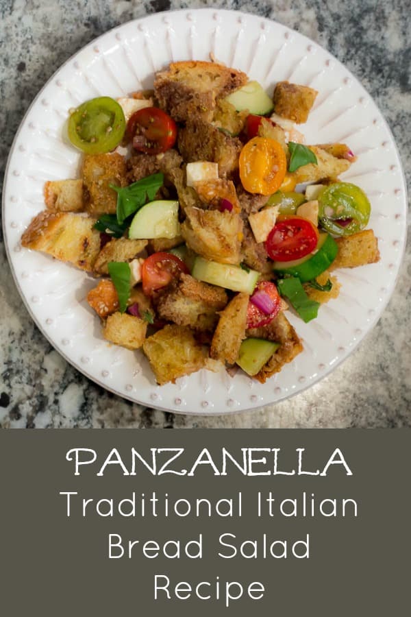 Panzanella is SCRUMPTIOUS! It's a traditional Italian bread salad recipe, and the best use of fresh summer tomatoes, fresh mozzarella, basil, and a balsamic vinaigrette I know! #panzanella #Italian #breadsalad #tomatoes #summersalad