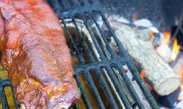 Smithfield Extra Tender Extra Meaty Pork Back Ribs, on the Grill, over a drip pan/moisture pan with Kingsford Charcoal and Hickory Wood