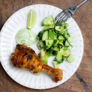 Peruvian Style Roasted Chicken is n incredibly juicy, spicy, delicious chicken with a Latin flair. Smoked paprika, cumin, bright citrus, and creamy cilantro and jalapeño sauce make this dish a MUST TRY!