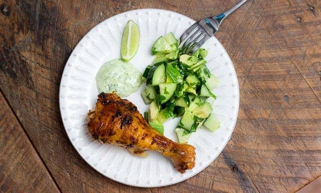 Peruvian Style Roasted Chicken is n incredibly juicy, spicy, delicious chicken with a Latin flair. Smoked paprika, cumin, bright citrus, and creamy cilantro and jalapeño sauce make this dish a MUST TRY!