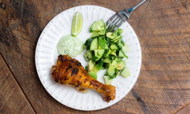 Peruvian Style Roasted Chicken is an incredibly juicy, spicy, delicious chicken with a Latin flair. Smoked paprika, cumin, bright citrus, and creamy cilantro and jalapeño sauce make this dish a MUST TRY!