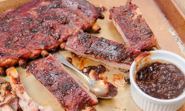 This recipe for Grilled Ribs with Bodacious Balsamic BBQ Sauce is easy and bodaciously delicious! #charcoal #recipe #ovenbaked #dryrub #easy #infoil