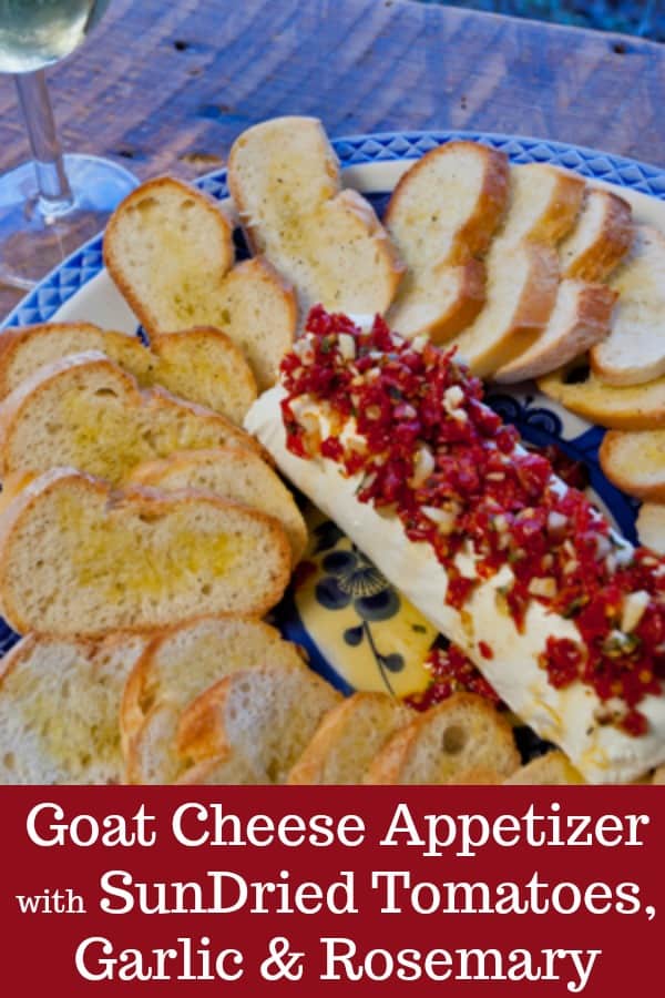 A holiday appetizer that's quick, easy, beautiful, and amazingly delicious! Goat Cheese with Sun-Dried Tomatoes, Garlic, and Rosemary on Crostini. Perfect for Christmas parties, too! #Thanksgiving #appetizer #holiday #cheese #chèvre #goatcheese #cheesebal