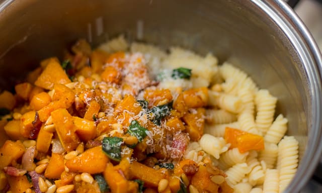 This fall recipe for roasted butternut squash with pine nuts, sage, and browned butter is the perfect comfort food for a cozy autumn evening. #ButternutSquash #bacon #sage #pasta #fallrecipe