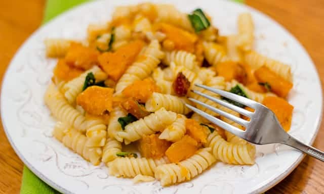 This fall recipe for roasted butternut squash with pine nuts, sage, and browned butter is the perfect comfort food for a cozy autumn evening. #ButternutSquash #bacon #sage #pasta #fallrecipe