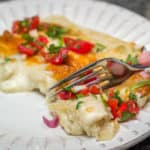 Easy, cheesy, creamy Tex-Mex comfort food! Sour Cream and Green Chile Enchiladas are a Family Favorite. #easy #cheesy #creamy #TexMex #CincodeMayo #enchiladas
