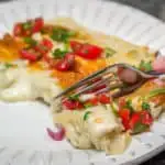 Permalink to: Sour Cream and Green Chile Enchiladas Easy, cheesy, creamy Tex-Mex comfort food! Sour Cream and Green Chile Enchiladas are a Family Favorite. #easy #cheesy #creamy #TexMex #CincodeMayo #enchiladas