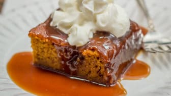 The fall dessert that *had* to happen: the UK's cherished childhood dessert, Sticky Toffee Pudding, meets the USA's pumpkin in the most luscious pumpkin dessert you'll ever have. The toffee sauce alone is enough to make the angels sing! #Thanksgivingdessert #falldessert #Thanksgivingrecipe #pumpkin #pumpkindessert