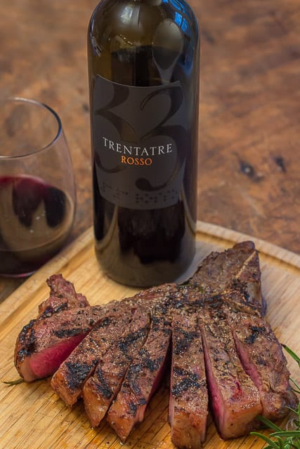 Trentatare Rosso and steak on cutting board