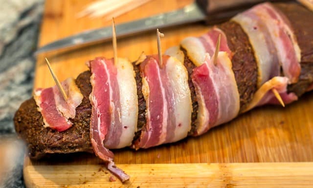 Easy, yet delicious enough for a gourmet palate: Grilled Bacon-Wrapped Venison Backstrap with Balsamic Cherries and Farro #grilling #venison #tenderloin #backstrap #baconwrappedvenison