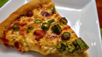 Take two Southern favorites, okra, and pimento cheese, and slather them atop a homemade crust, and you've got an amazingly awesome pizza: Roasted Okra on Pimento Cheese Pizza. #pizza #Southern #okra #pimentocheese
