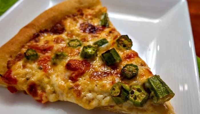 Take two Southern favorites, okra, and pimento cheese, and slather them atop a homemade crust, and you've got an amazingly awesome pizza: Roasted Okra on Pimento Cheese Pizza. #pizza #Southern #okra #pimentocheese