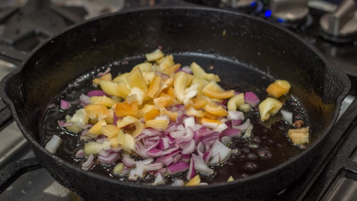 Sautéing the onions and peppers for Savory Summer Squash Pie