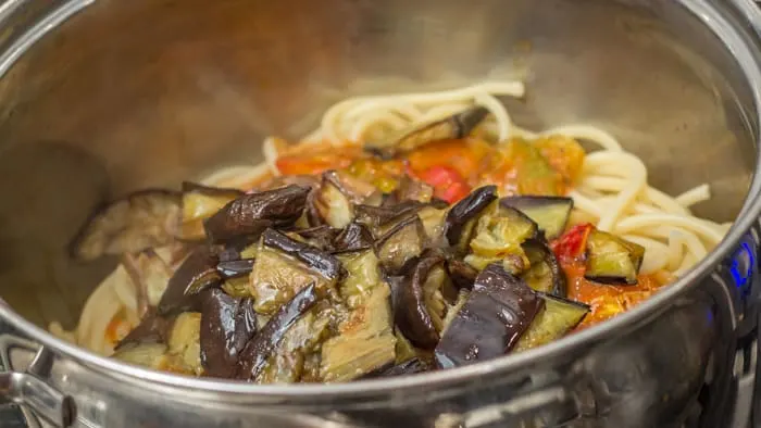 Adding the roasted eggplant to the Pasta Alla Norma