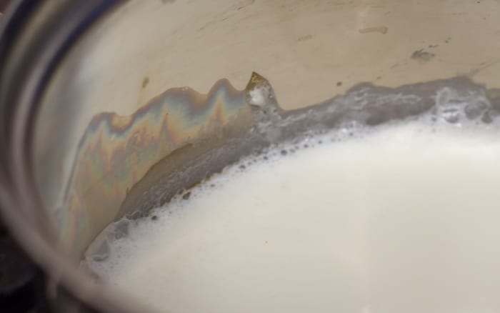 Heat milk over low heat just until bubbles form.
