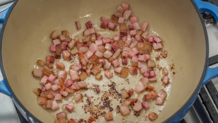 Bacon browning in pot.