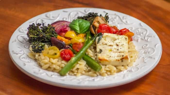 Plated: Sheet Pan Baked Feta with Baby Broccoli, Tomatoes, and Lemon.