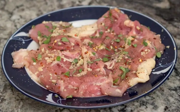 Marinate the chicken in the spices for 1 hour at room temperature, or for several hours in the fridge.