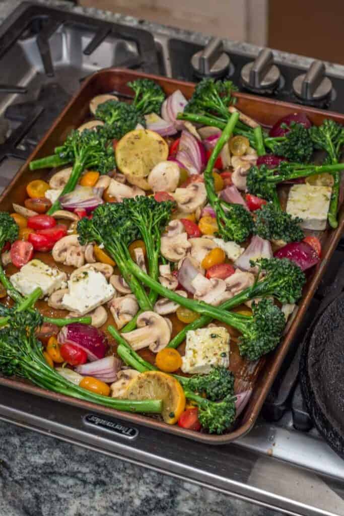 Sheet Pan Baked Feta with Baby Broccoli, Tomatoes, and Lemon That