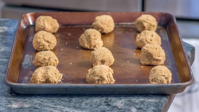 Cookie dough balls ready for the oven.