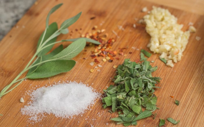 The herbs and spices I used to marinate the chicken for an hour: salt, sage, red pepper flakes, and garlic.