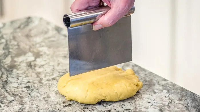 After the pasta has rested for at least an hour (and longer is fine), it's time to begin the rolling and cutting process. ,