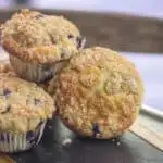 Permalink to: Better Than Jordan Marsh Blueberry Muffins A pile of muffins.